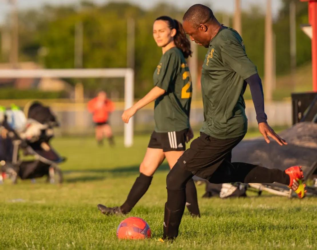 Person kicking a ball